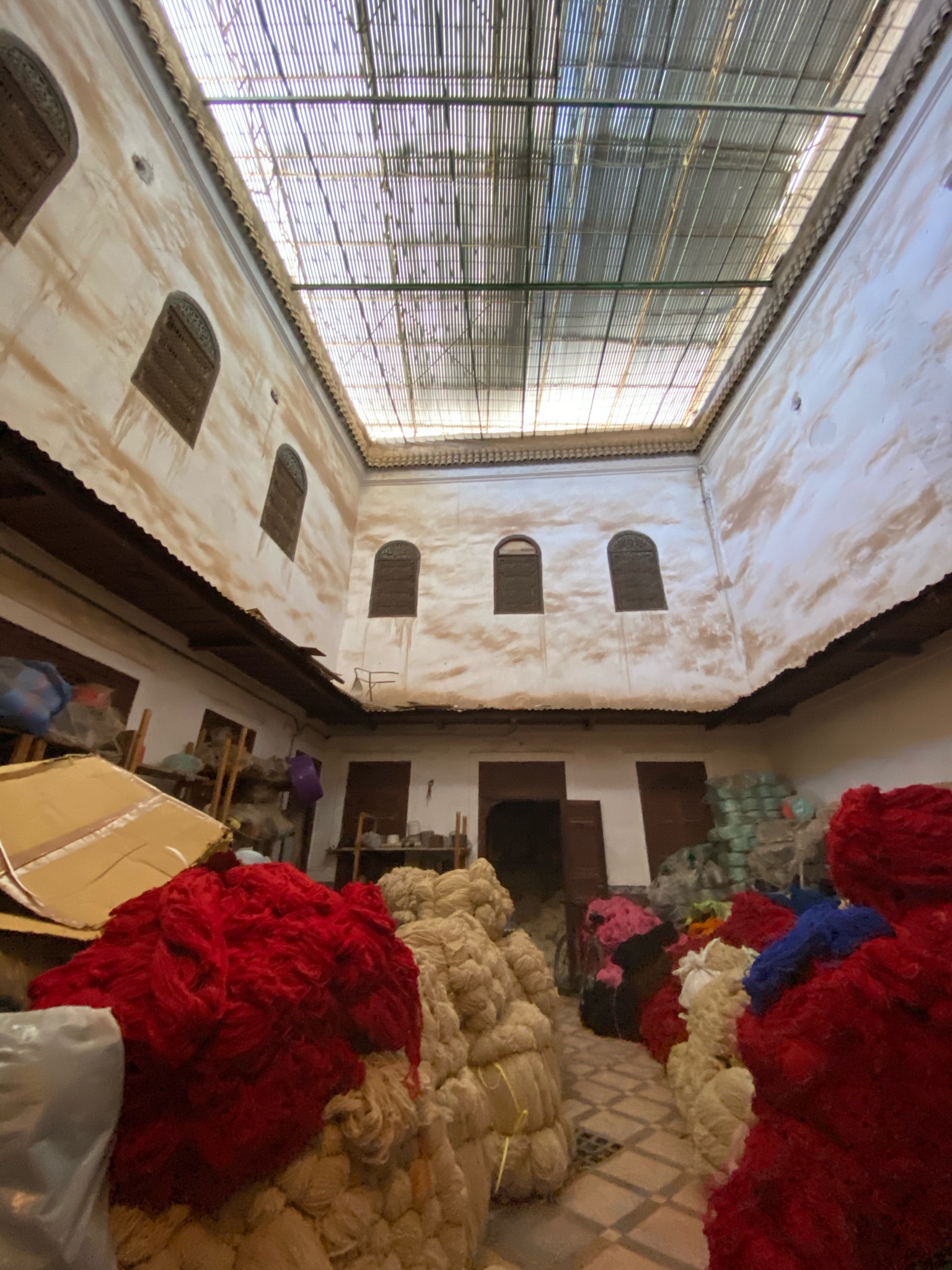 Raw cotton and wool in a traditional Marrakesh workshop