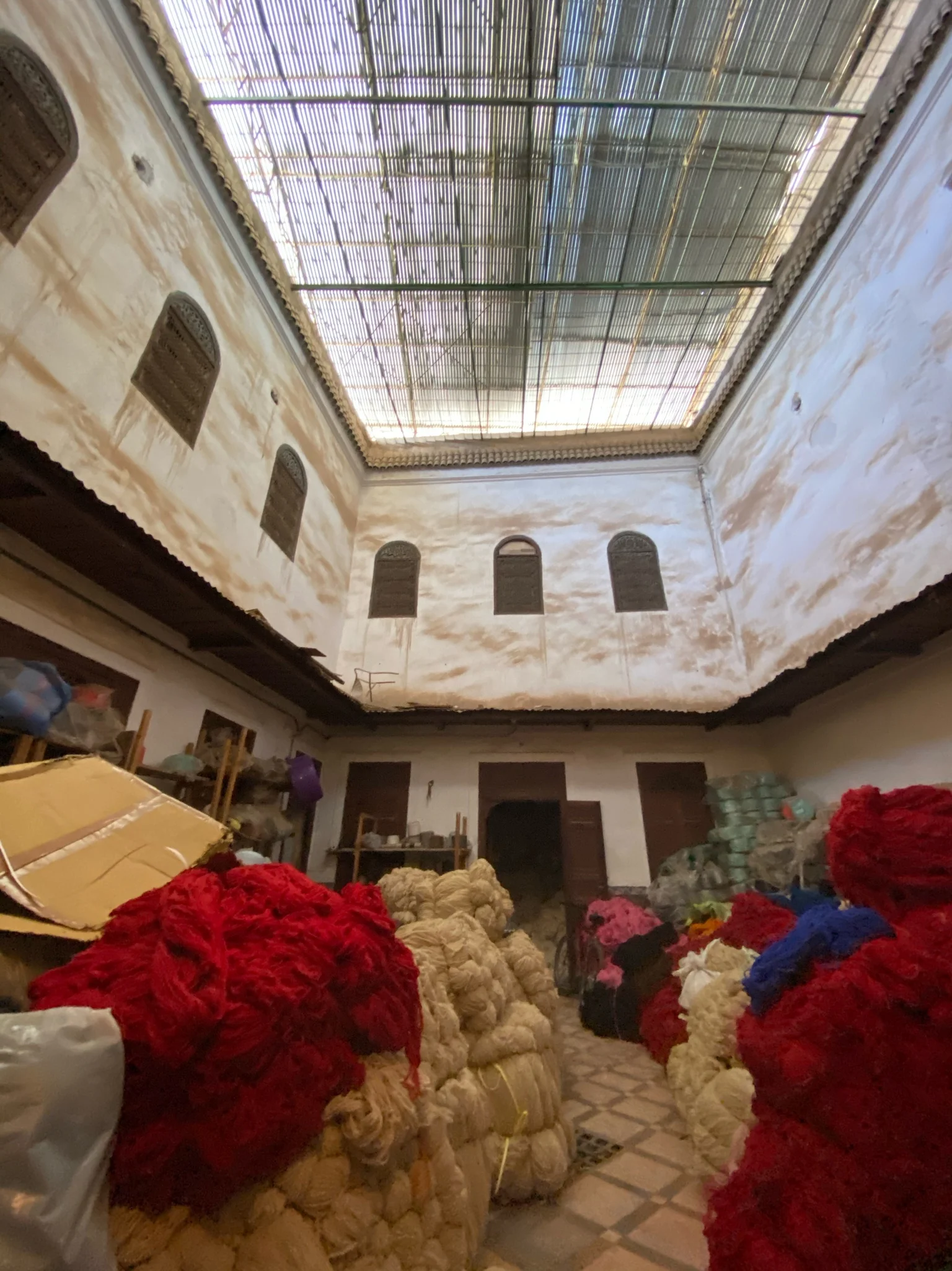 Raw fibers and textiles in a Marrakesh workshop