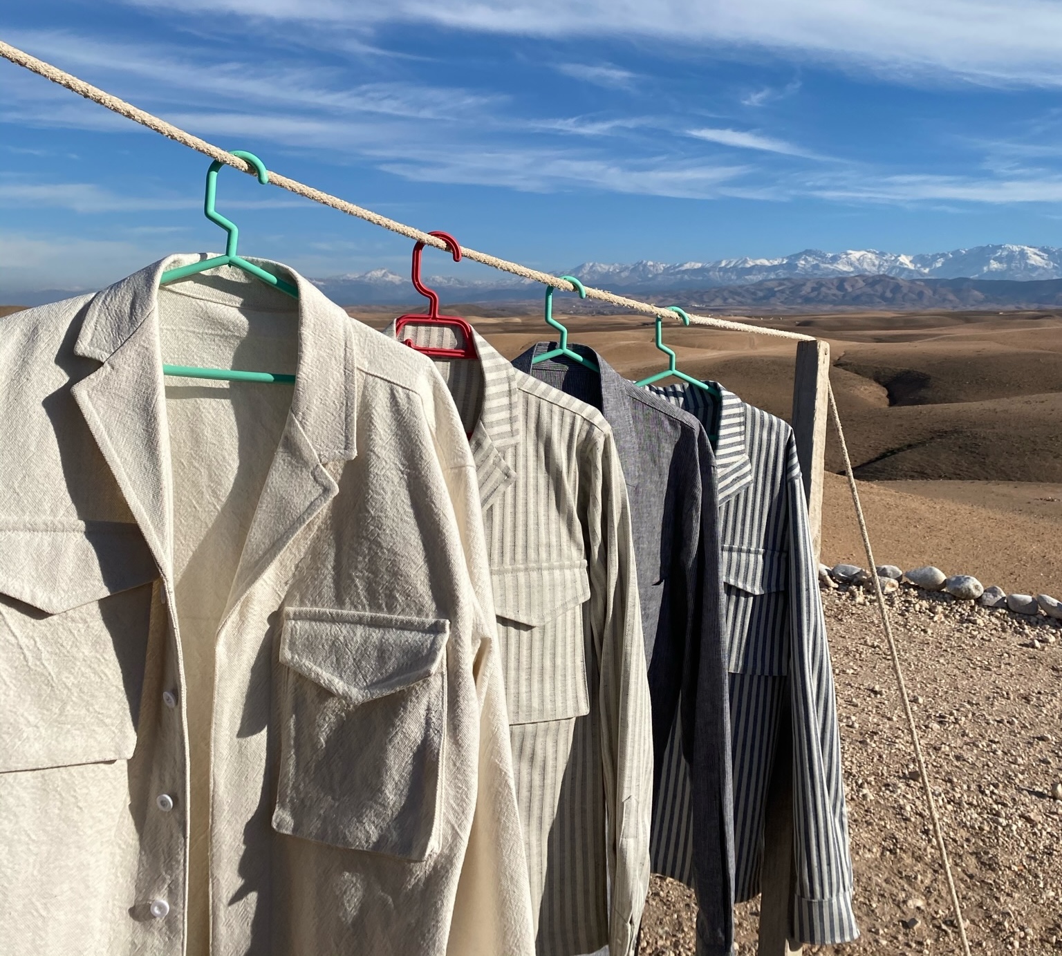 Shirts hanging on a line with the Atlas mountains
